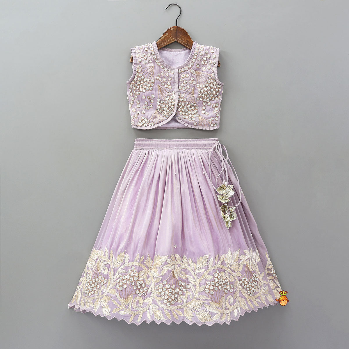 Pre Order: Embroidered Stylish Hem Shimmery Top And Pleated Lehenga With Net Dupatta