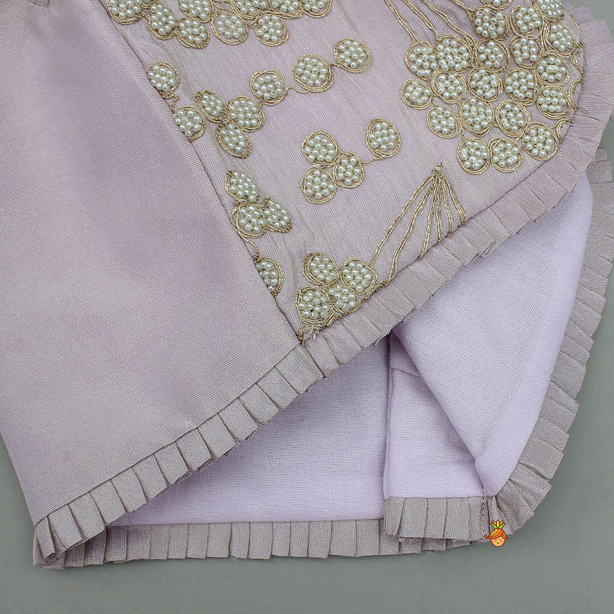 Pre Order: Embroidered Stylish Hem Shimmery Top And Pleated Lehenga With Net Dupatta