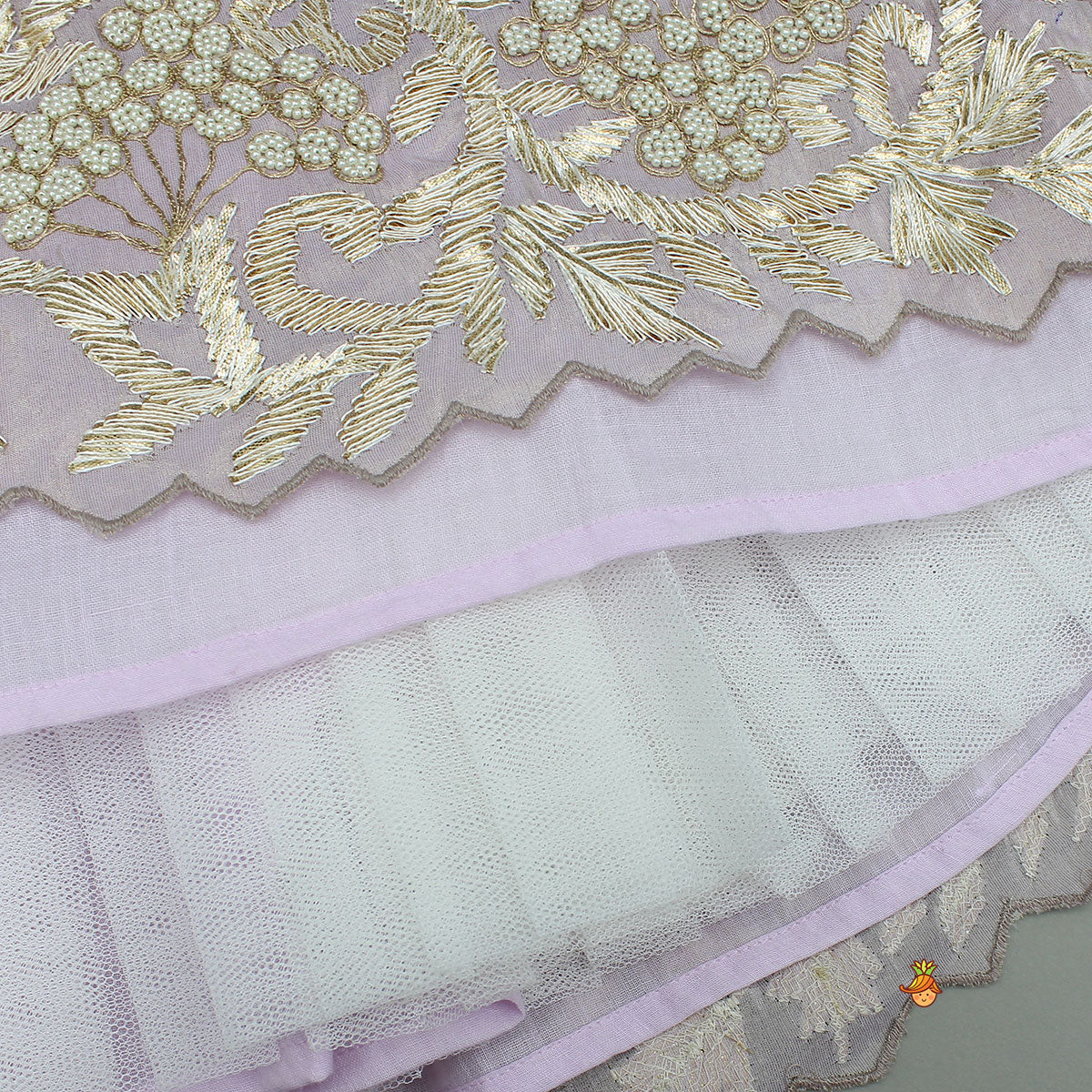 Pre Order: Embroidered Stylish Hem Shimmery Top And Pleated Lehenga With Net Dupatta