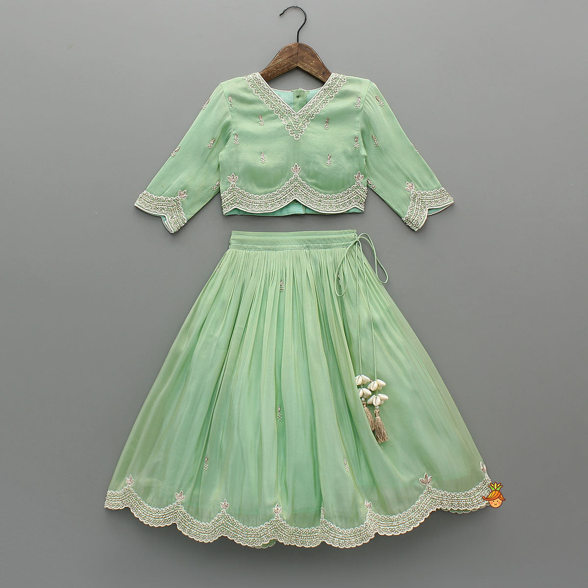 Pre Order: Stylish Hem Embroidered Top And Scalloped Lehenga