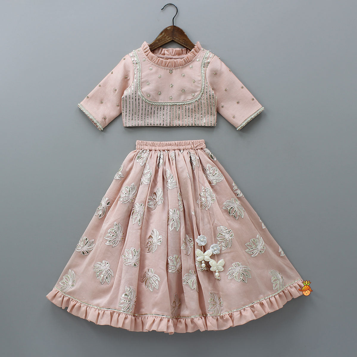 Pre Order: Frill-Enhanced Neckline Embroidered Top With Lehenga And Net Dupatta