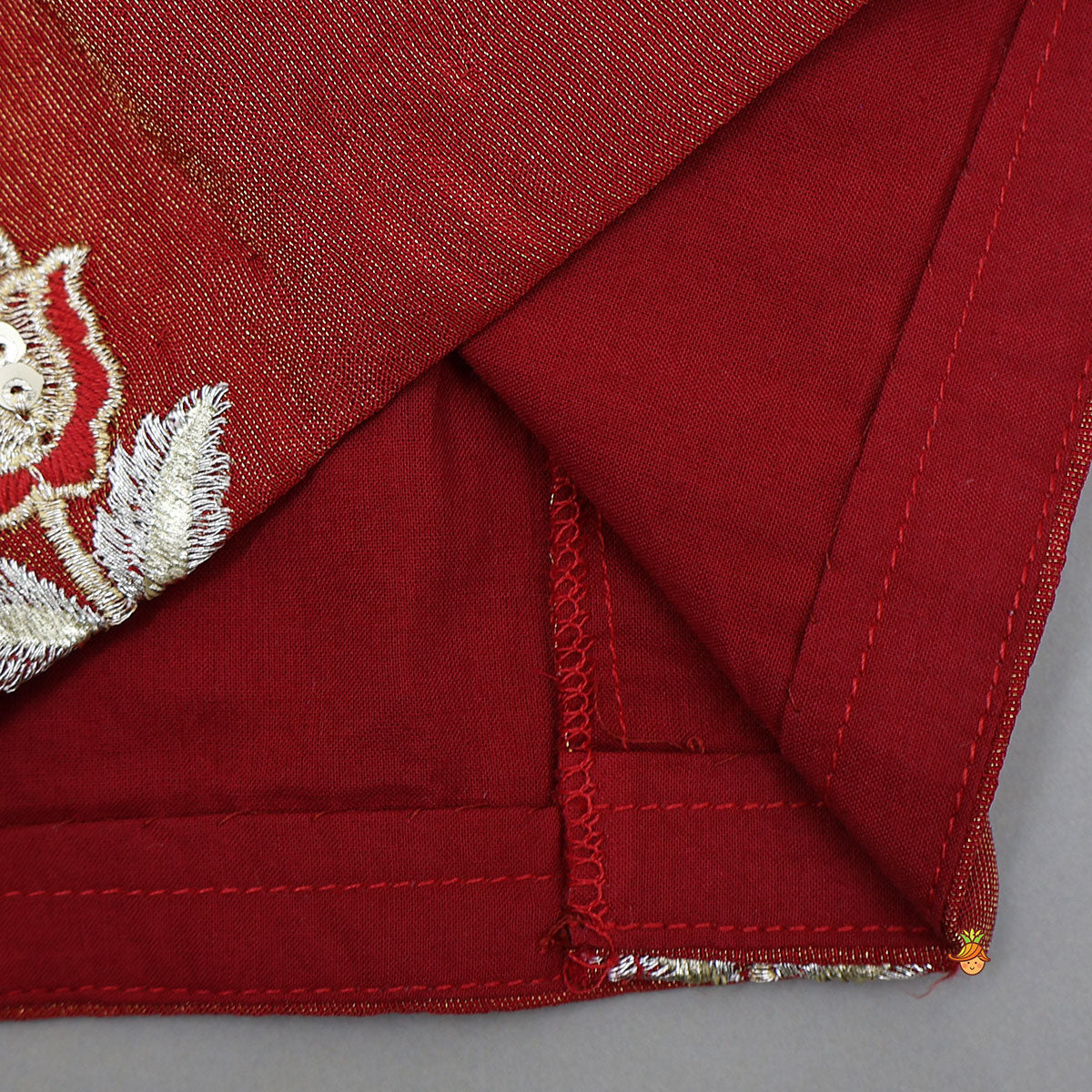 Pre Order: Intricately Flower-Embroidered Shimmery Top And Lehenga