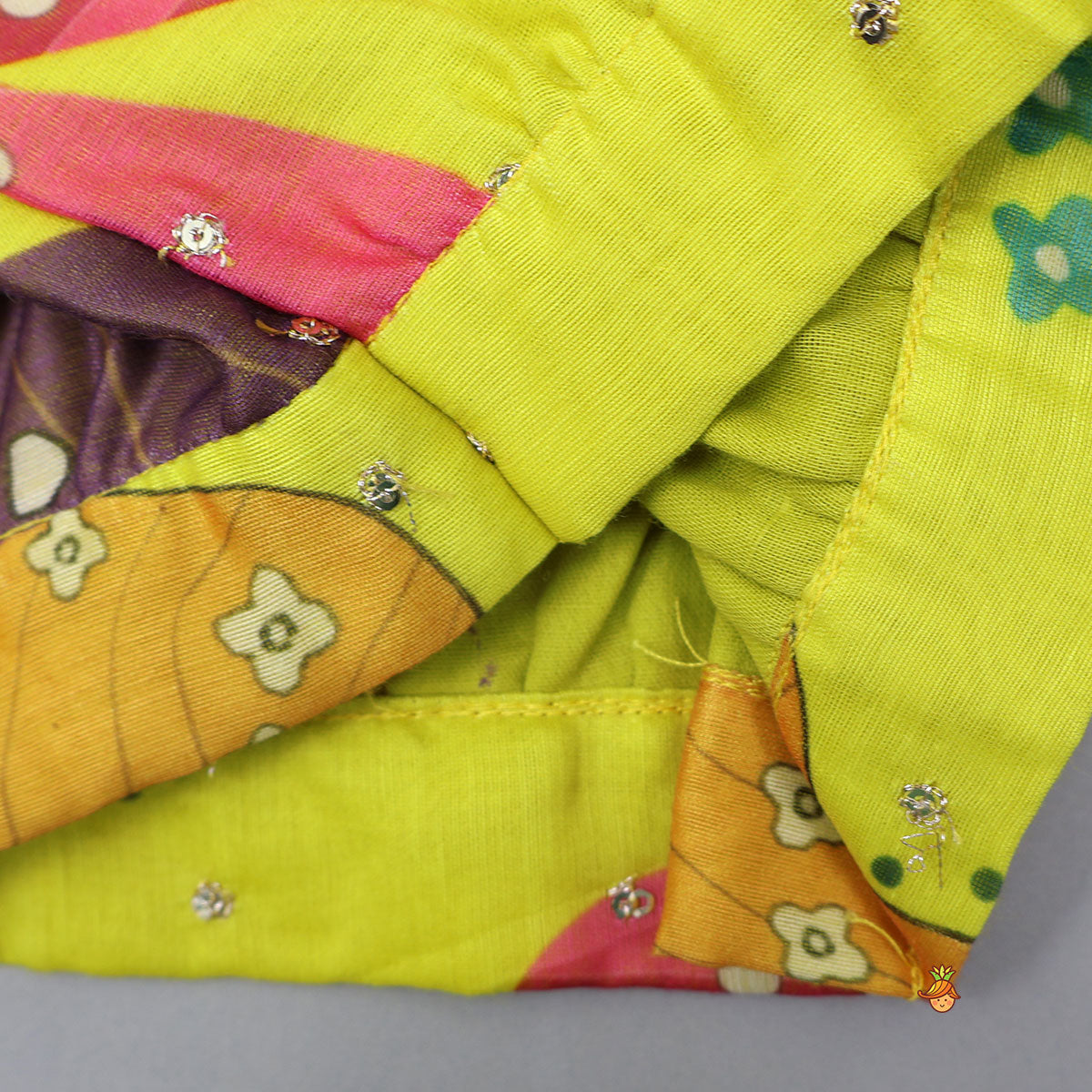 Pre Order: Multicolour Printed Net Detailed Top With Layered Matching Lehenga