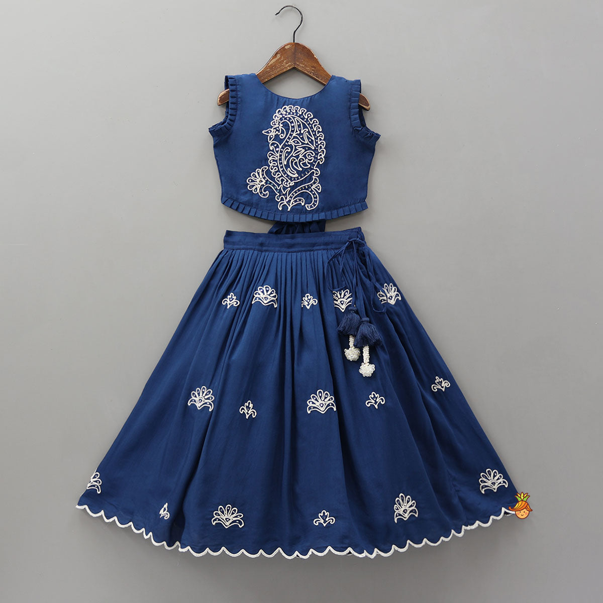 Pre Order: Dual Back Knot Detail Top And Tassels Enhanced Lehenga