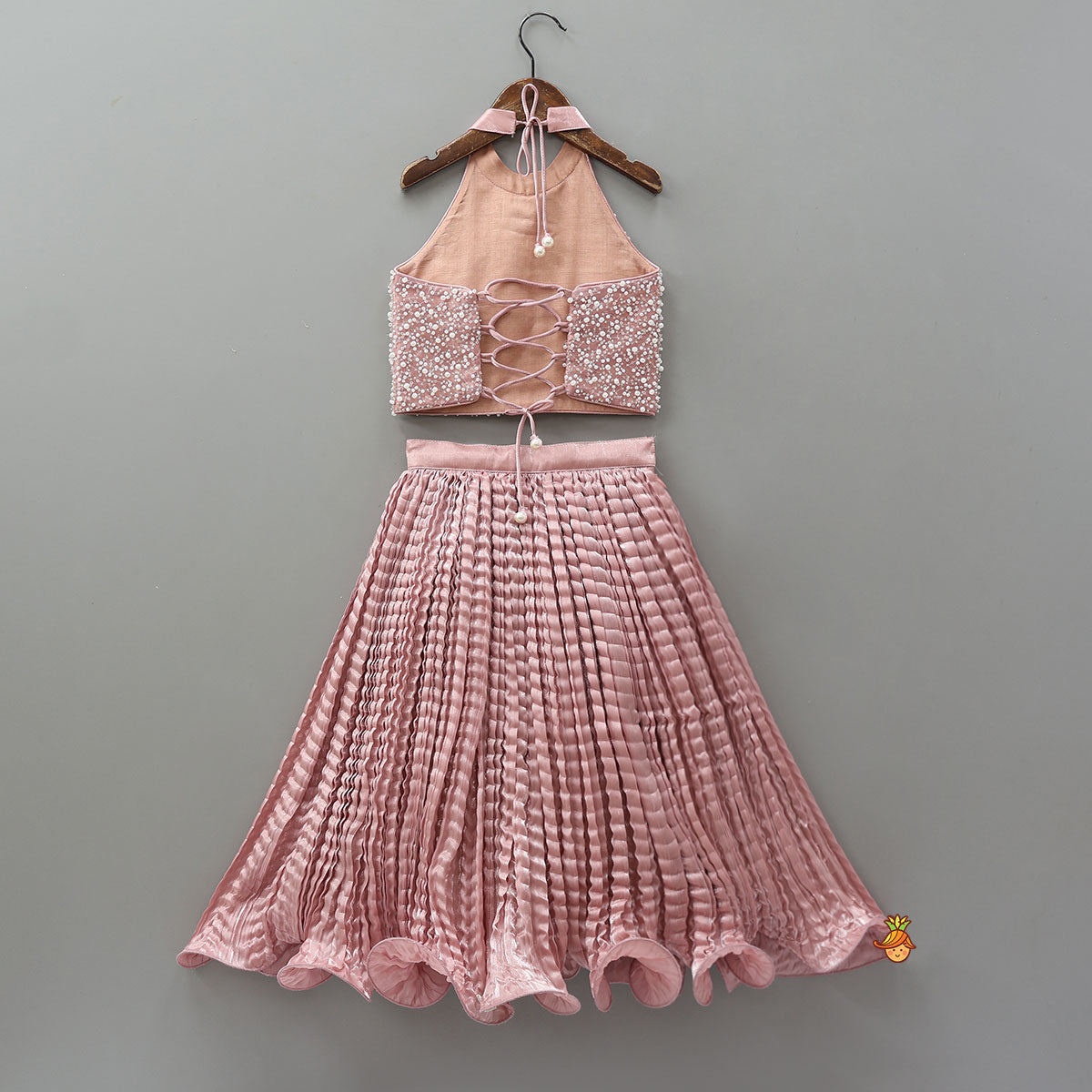 Pre Order: Gorgeous Criss-Cross Back Knot Top And Crushed Lehenga With Matching Hair Tie