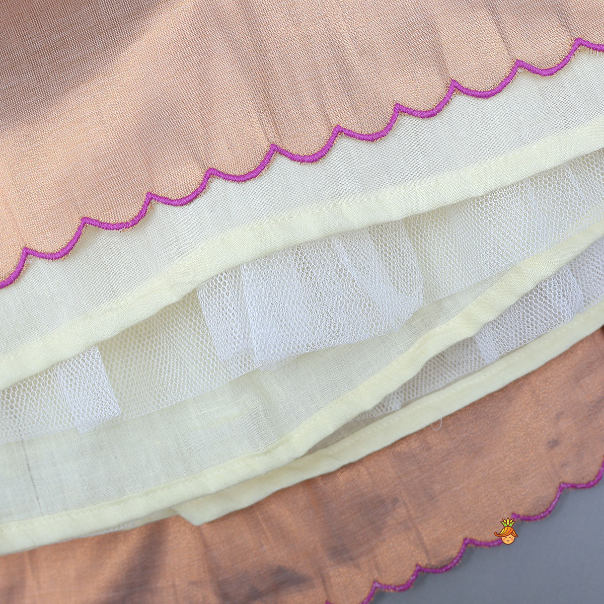 Pre Order: Scalloped Hem Shimmery Top And Panel Lehenga