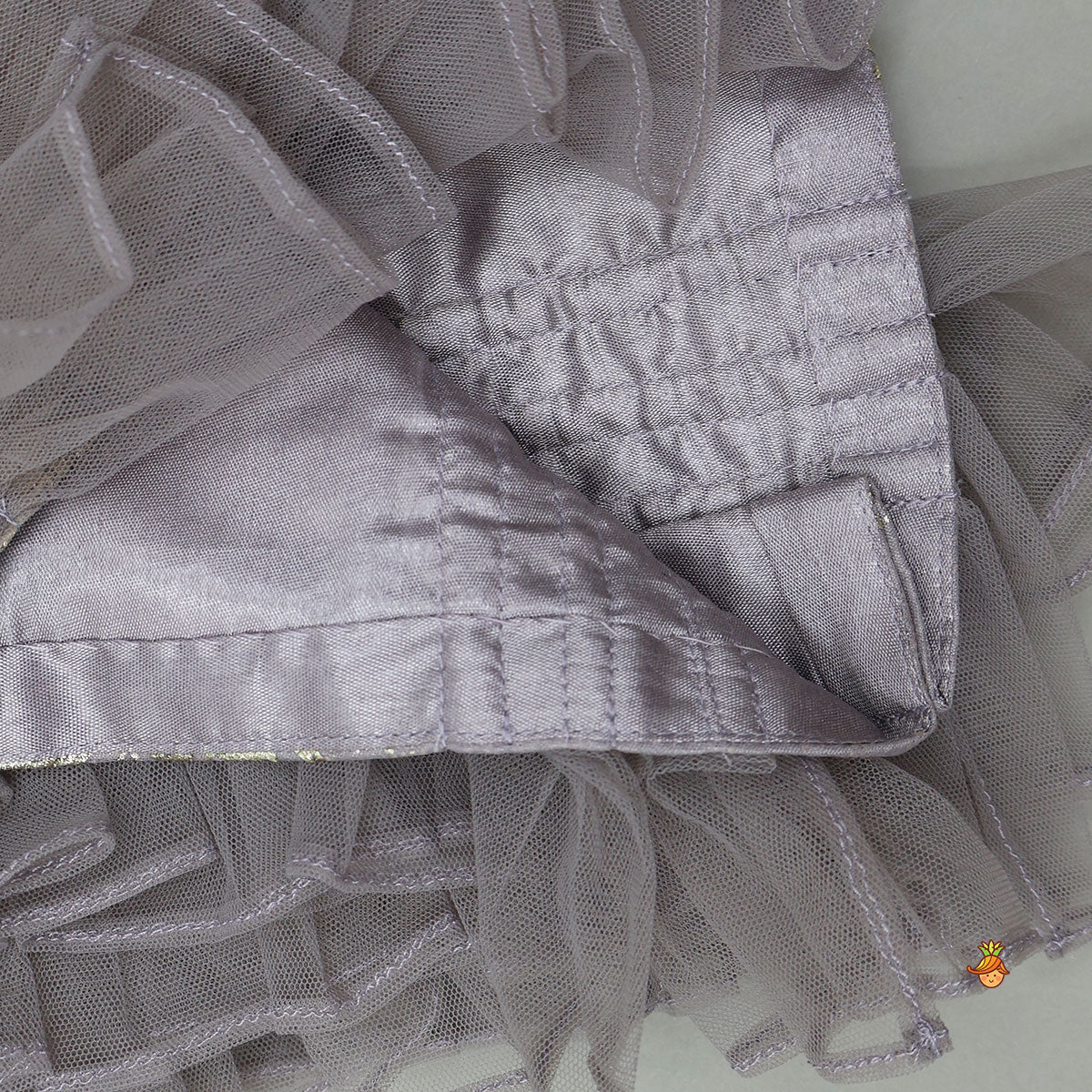 Pre Order: V-Neck Foil Printed Top And Layered Lehenga