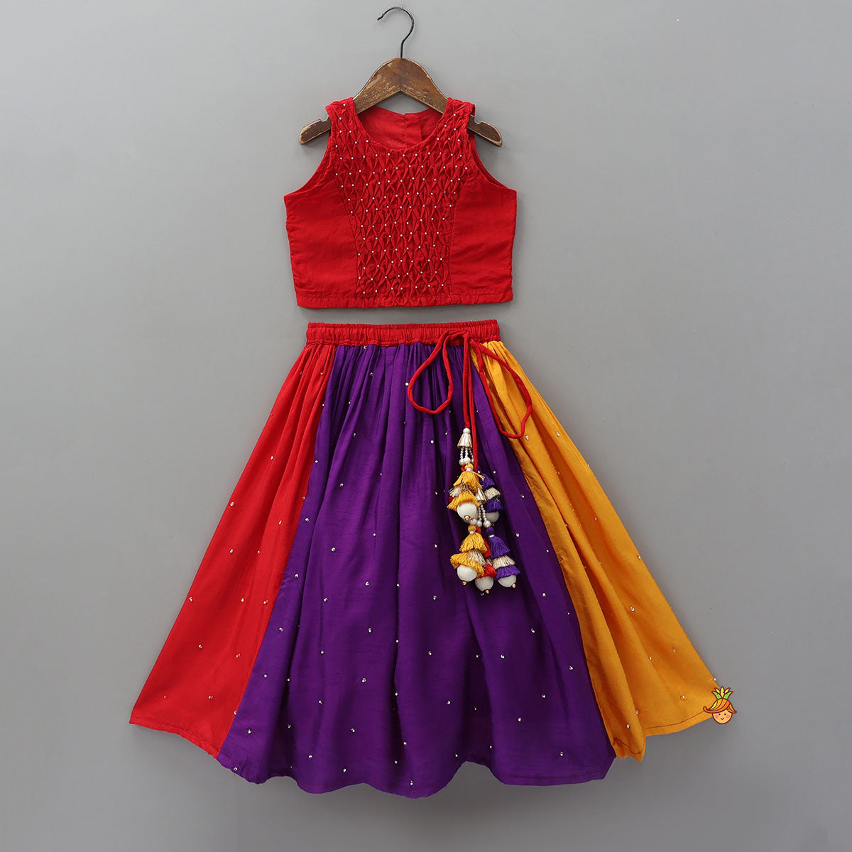 Pre Order: Elegant Top And Multi-Panel Colour-Block Lehenga With Mirror Work Dupatta