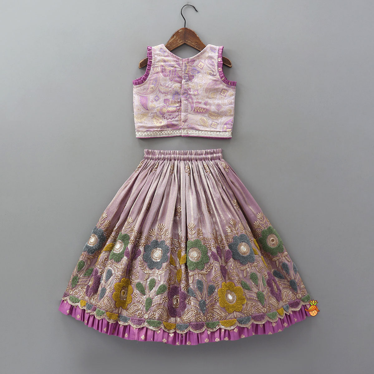 Pre Order: Pleated Armhole Top And Shimmery Lehenga With Matching Net Dupatta