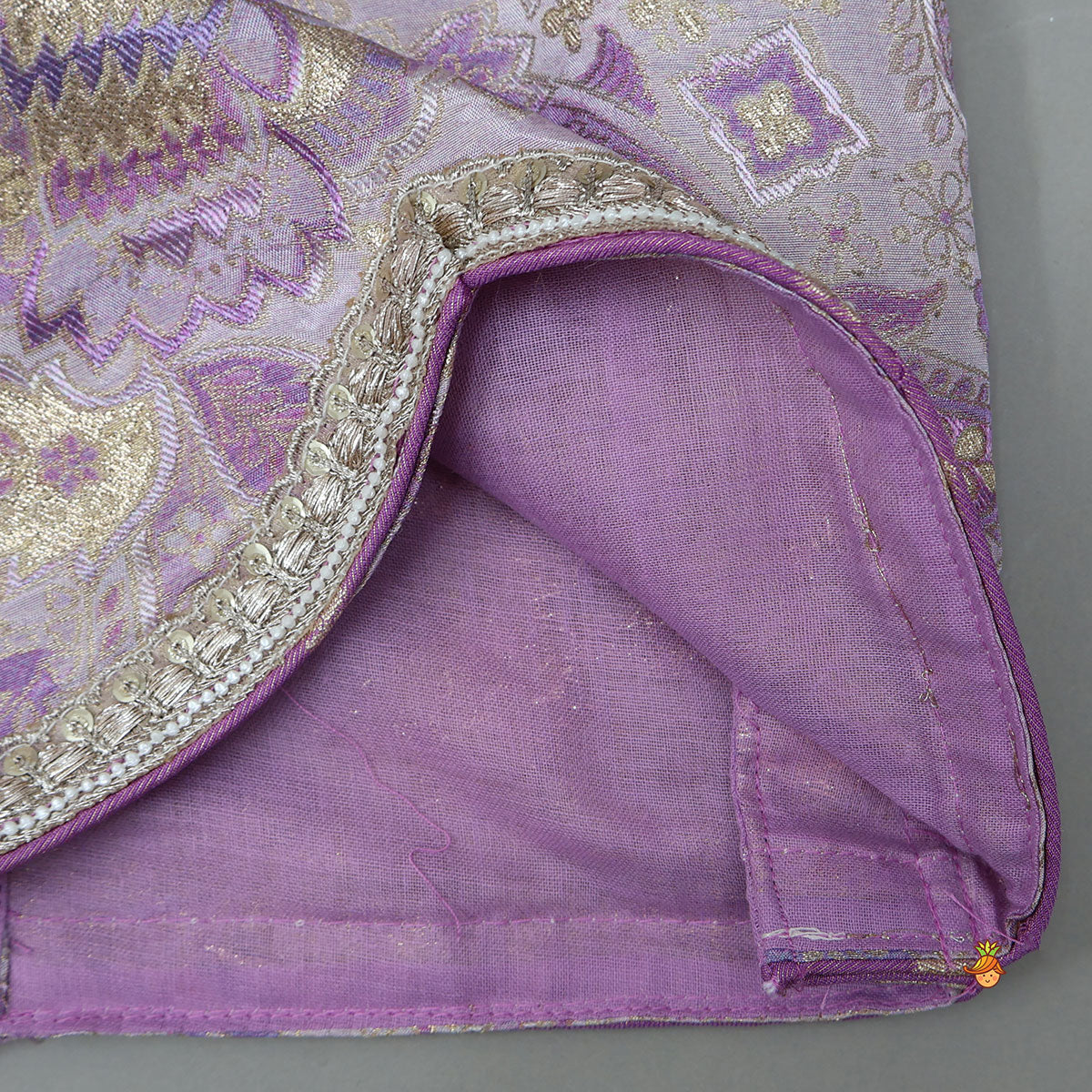 Pre Order: Pleated Armhole Top And Shimmery Lehenga With Matching Net Dupatta