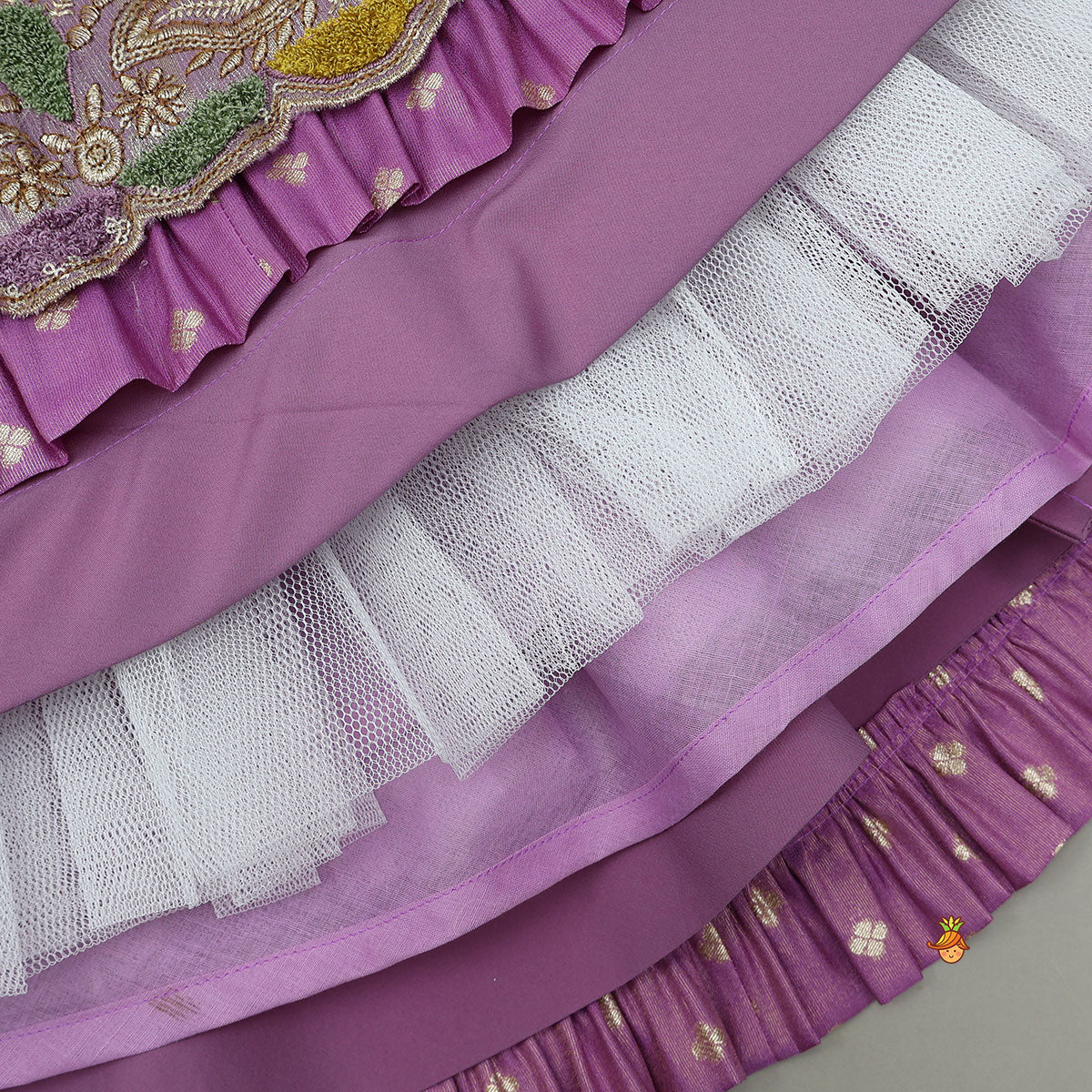 Pre Order: Pleated Armhole Top And Shimmery Lehenga With Matching Net Dupatta