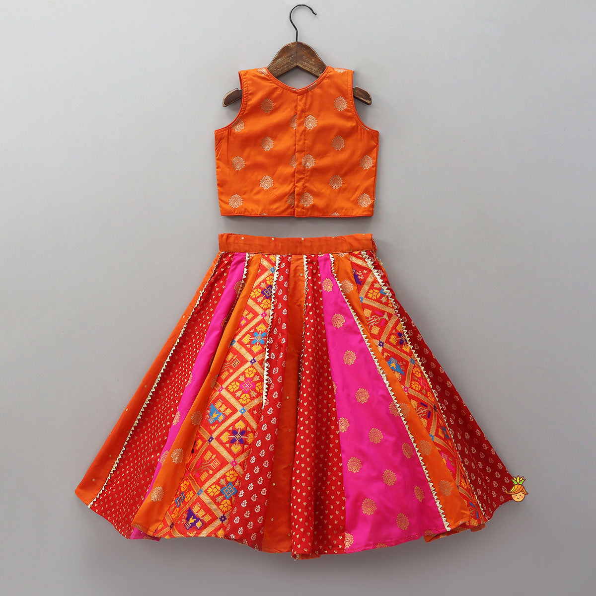 Pre Order: Embroidered Elegant Top And Brocade Lehenga With Matching Net Dupatta And Brocade Potli Bag