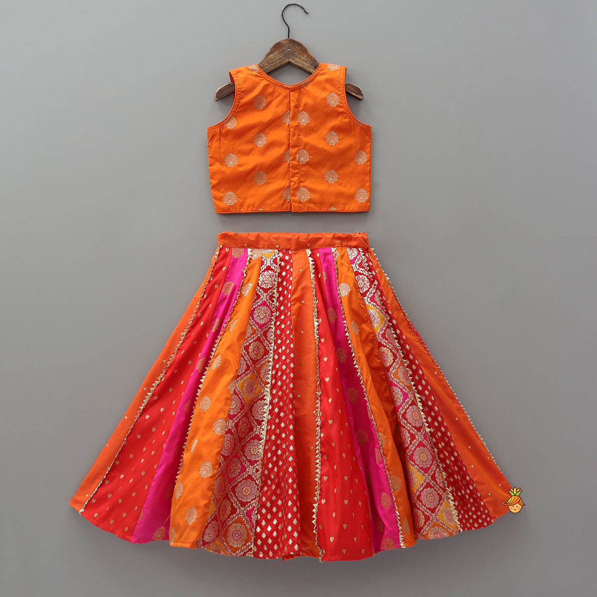 Pre Order: Embroidered Elegant Top And Brocade Lehenga With Matching Net Dupatta And Brocade Potli Bag