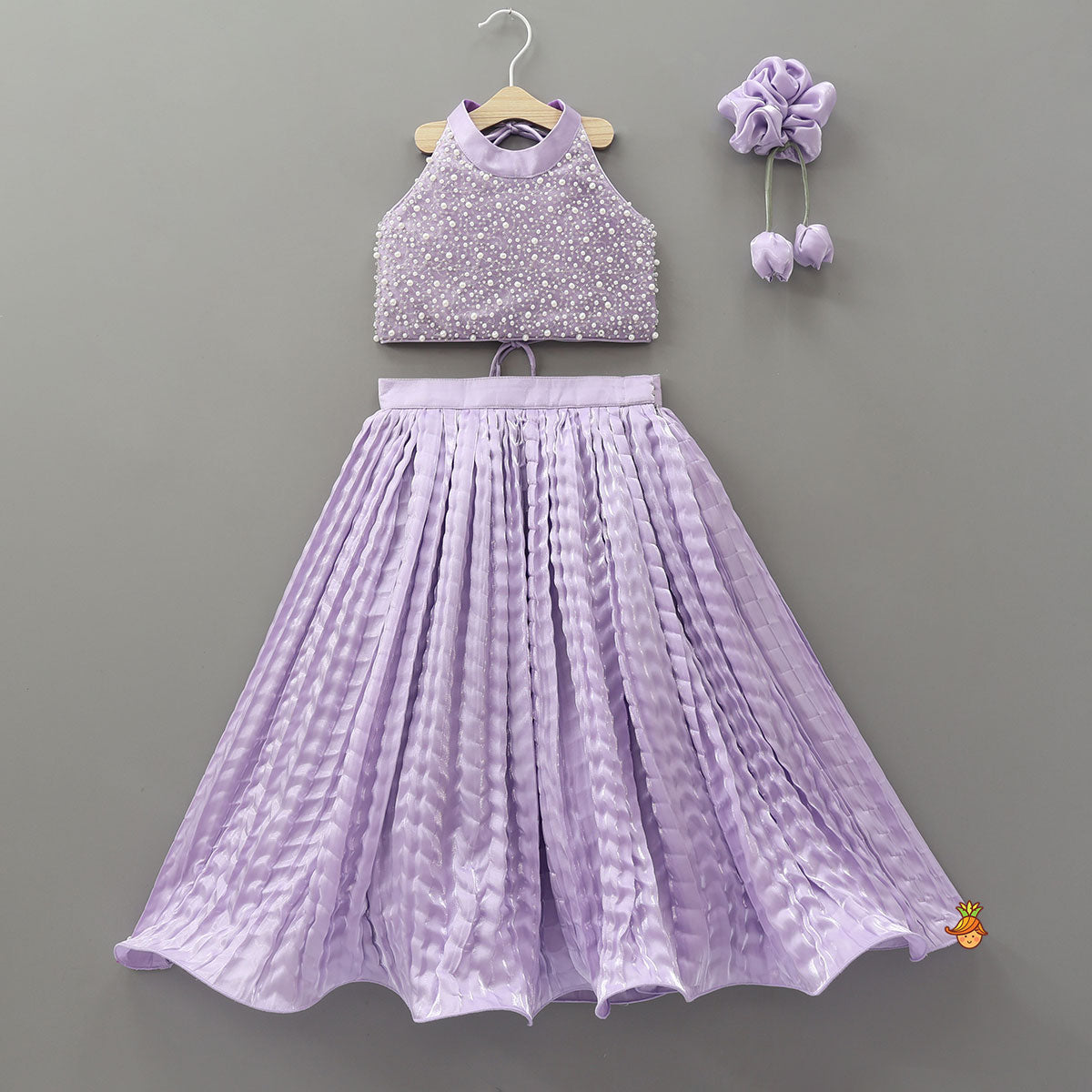 Pre Order: Stunning Criss-Cross Back Knot Top And Crushed Sheen Lehenga With Matching Hair Tie