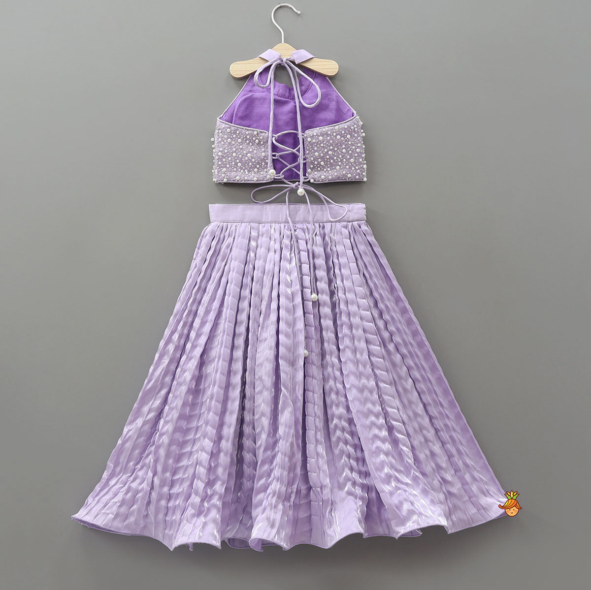 Pre Order: Stunning Criss-Cross Back Knot Top And Crushed Sheen Lehenga With Matching Hair Tie