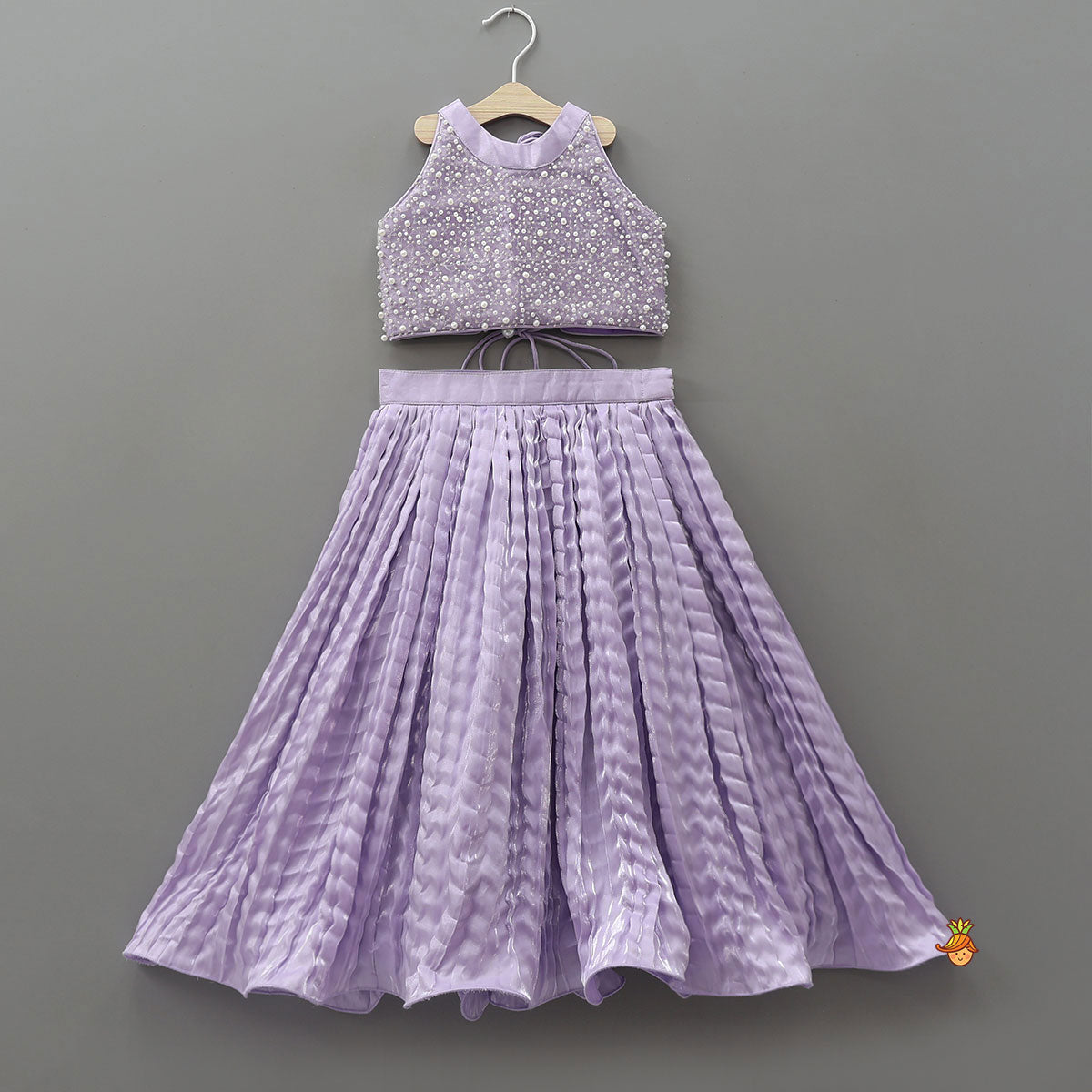 Pre Order: Stunning Criss-Cross Back Knot Top And Crushed Sheen Lehenga With Matching Hair Tie