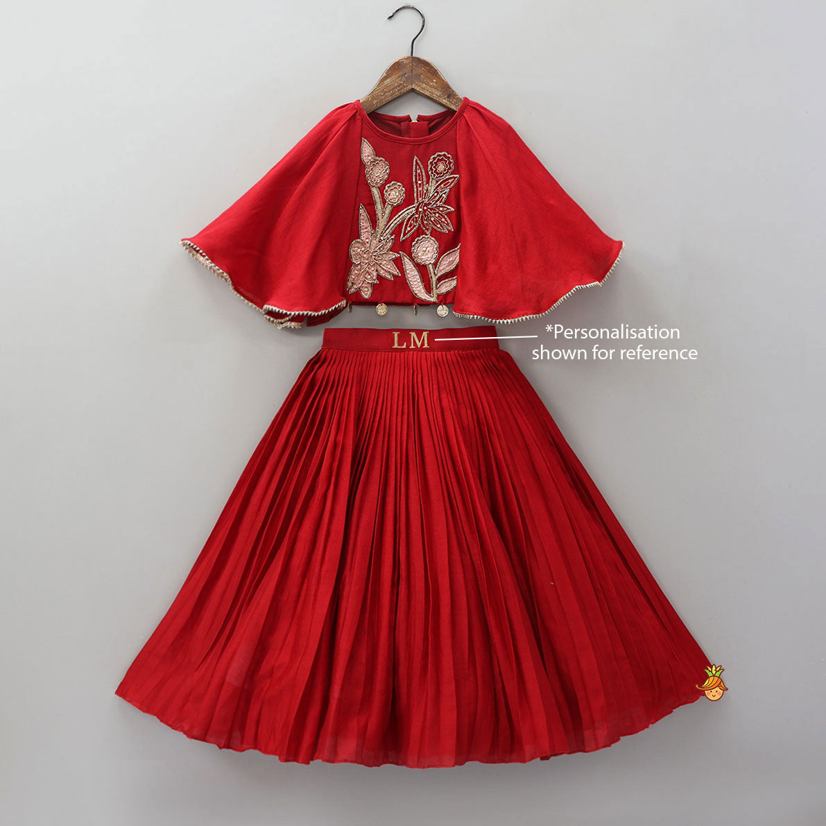 Pre Order: Cape Style Hand Embroidered Top And Pleated Lehenga