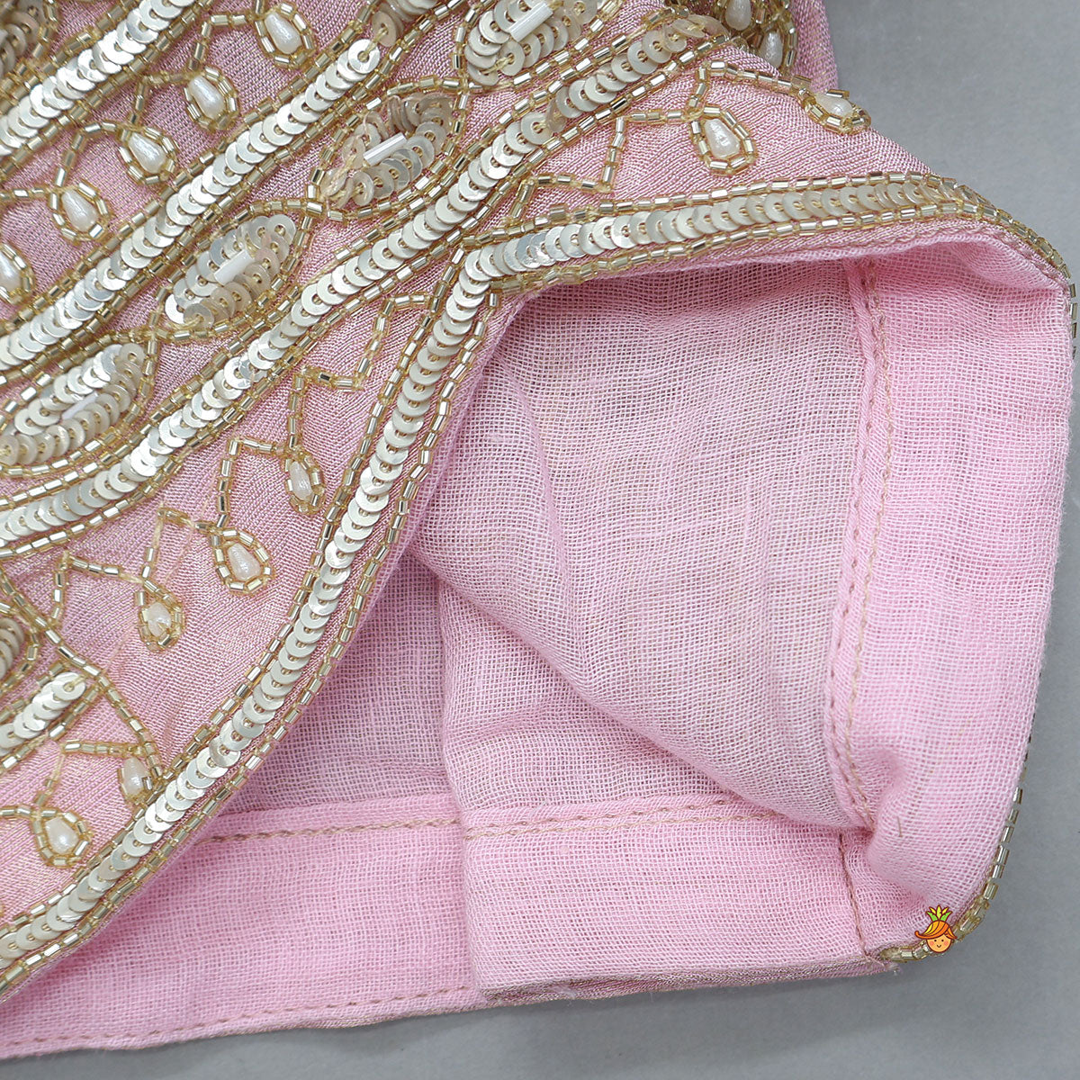 Pre Order: Triple Knot Detail Shimmery Top And Lehenga With Net Dupatta