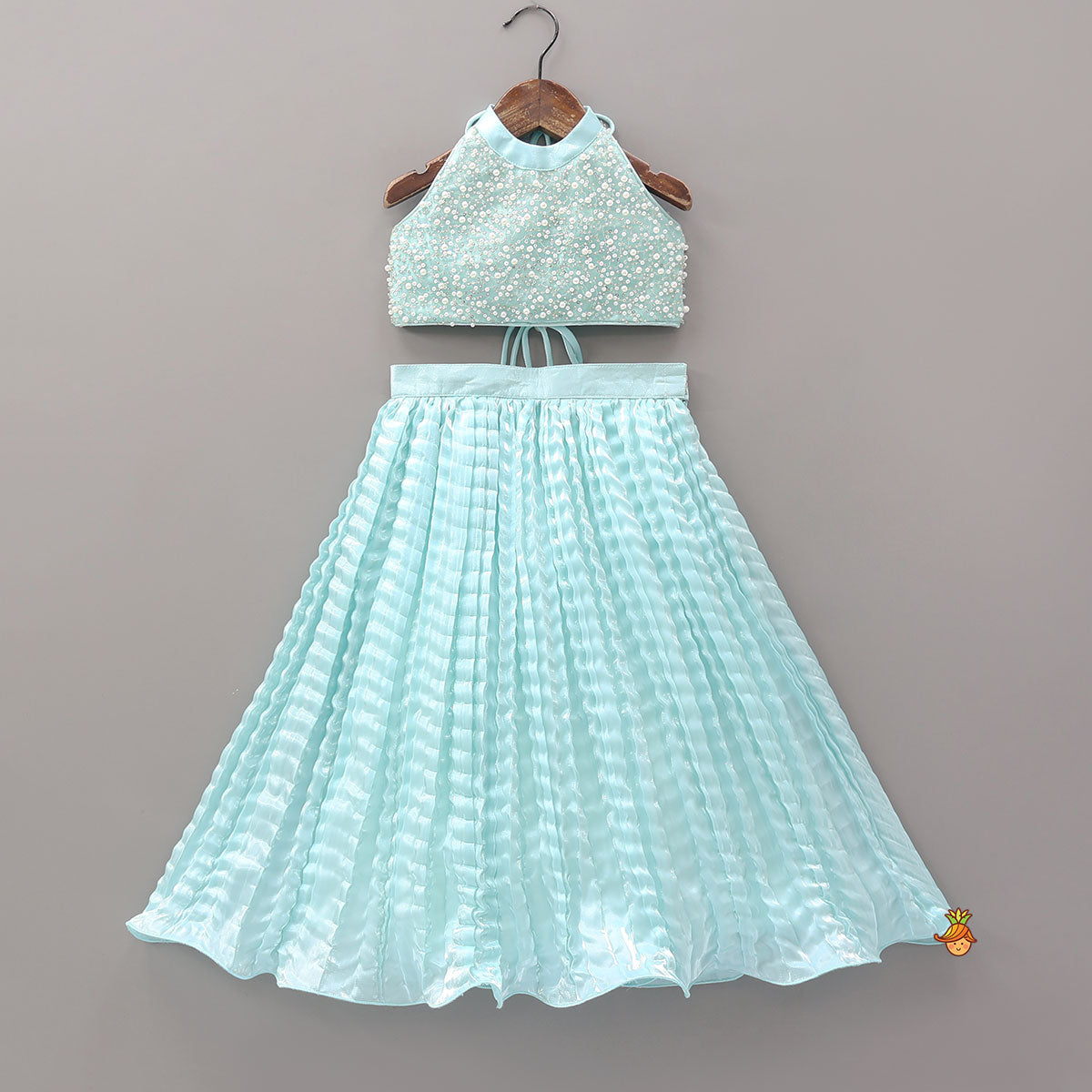 Stunning Criss-Cross Back Knot Top And Crushed Sheen Lehenga With Hair Tie