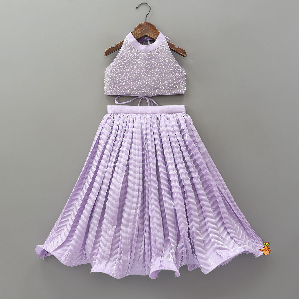 Stunning Criss Cross Back Knot Top And Crushed Sheen Lehenga With Matching Hair Tie