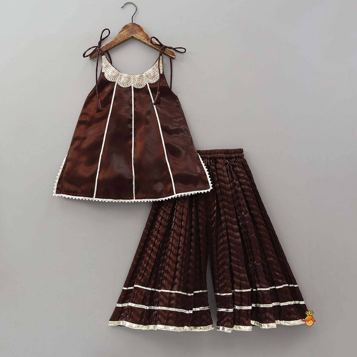 Pre Order: Sleeveless Sheen Kurti And Crushed Fabric Palazzo With Hair Tie