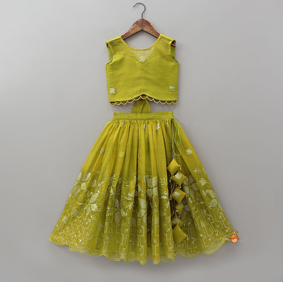 Pre Order: Organza Top And Lehenga With Handmade Tassel Detailing