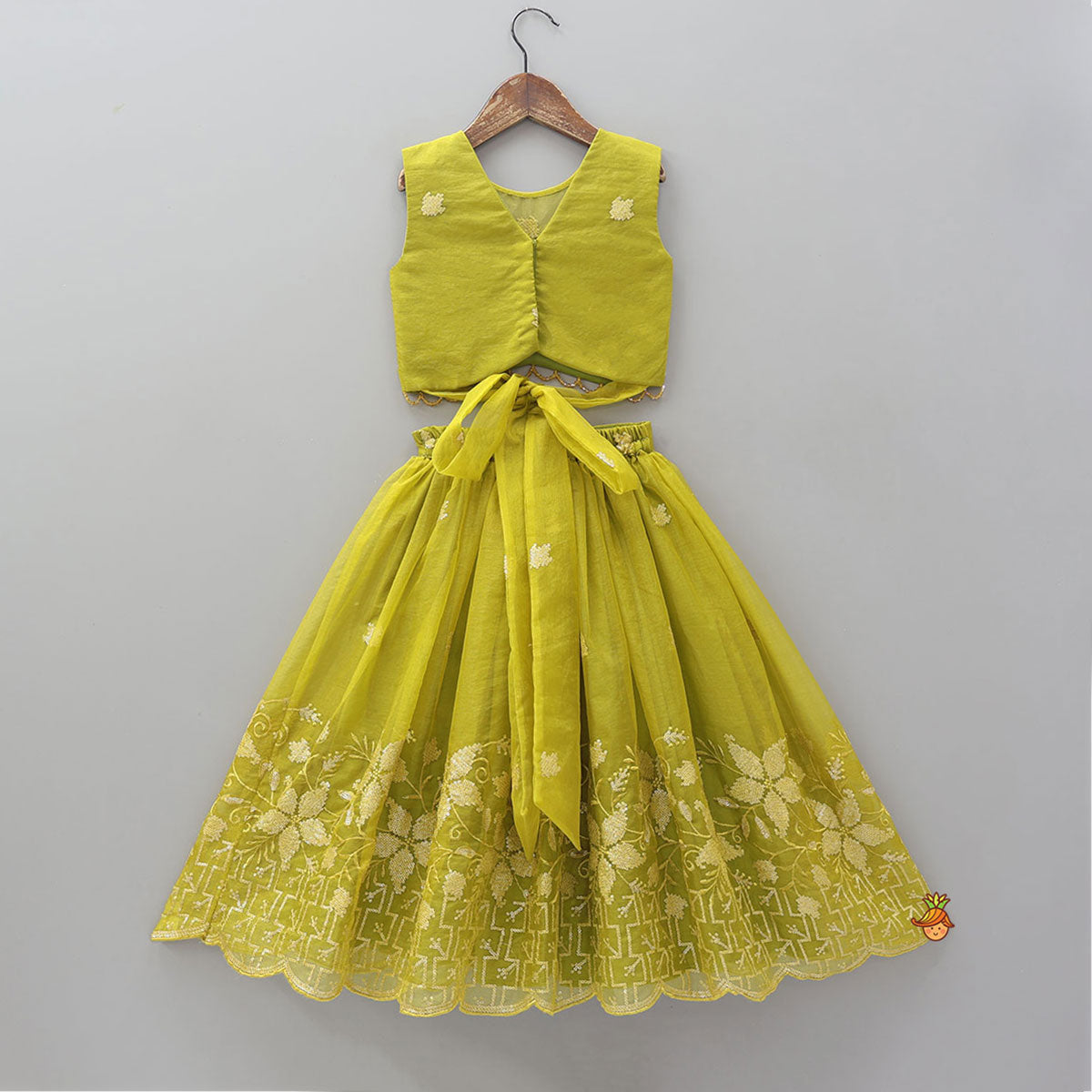 Pre Order: Organza Top And Lehenga With Handmade Tassel Detailing