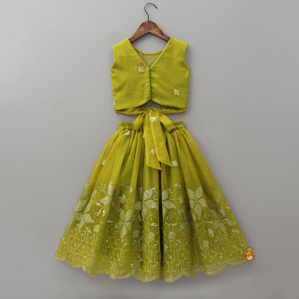 Pre Order: Organza Top And Lehenga With Handmade Tassel Detailing