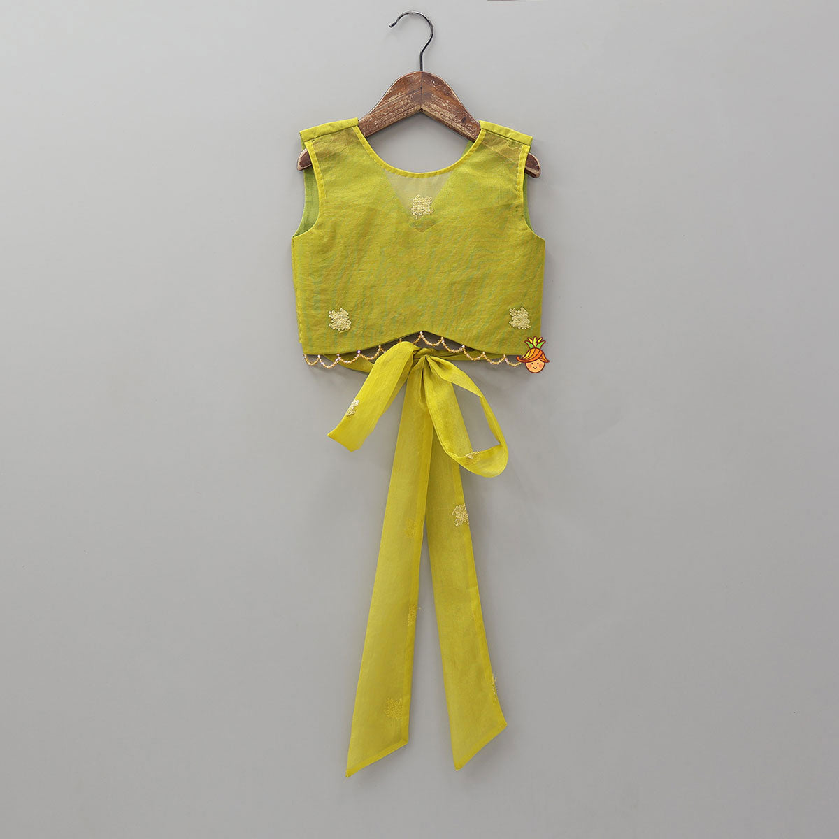 Pre Order: Organza Top And Lehenga With Handmade Tassel Detailing
