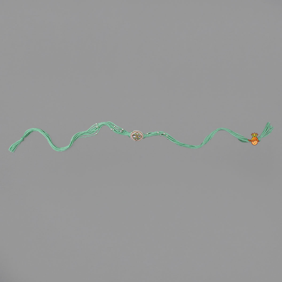 Cotton Thread Rakhi With Beautiful Charm