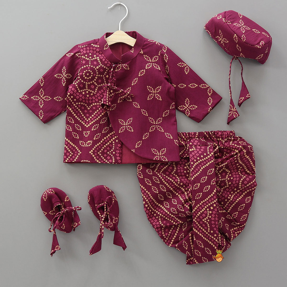 Bandhani Printed Kurta And Matching Dhoti With Cap And Booties