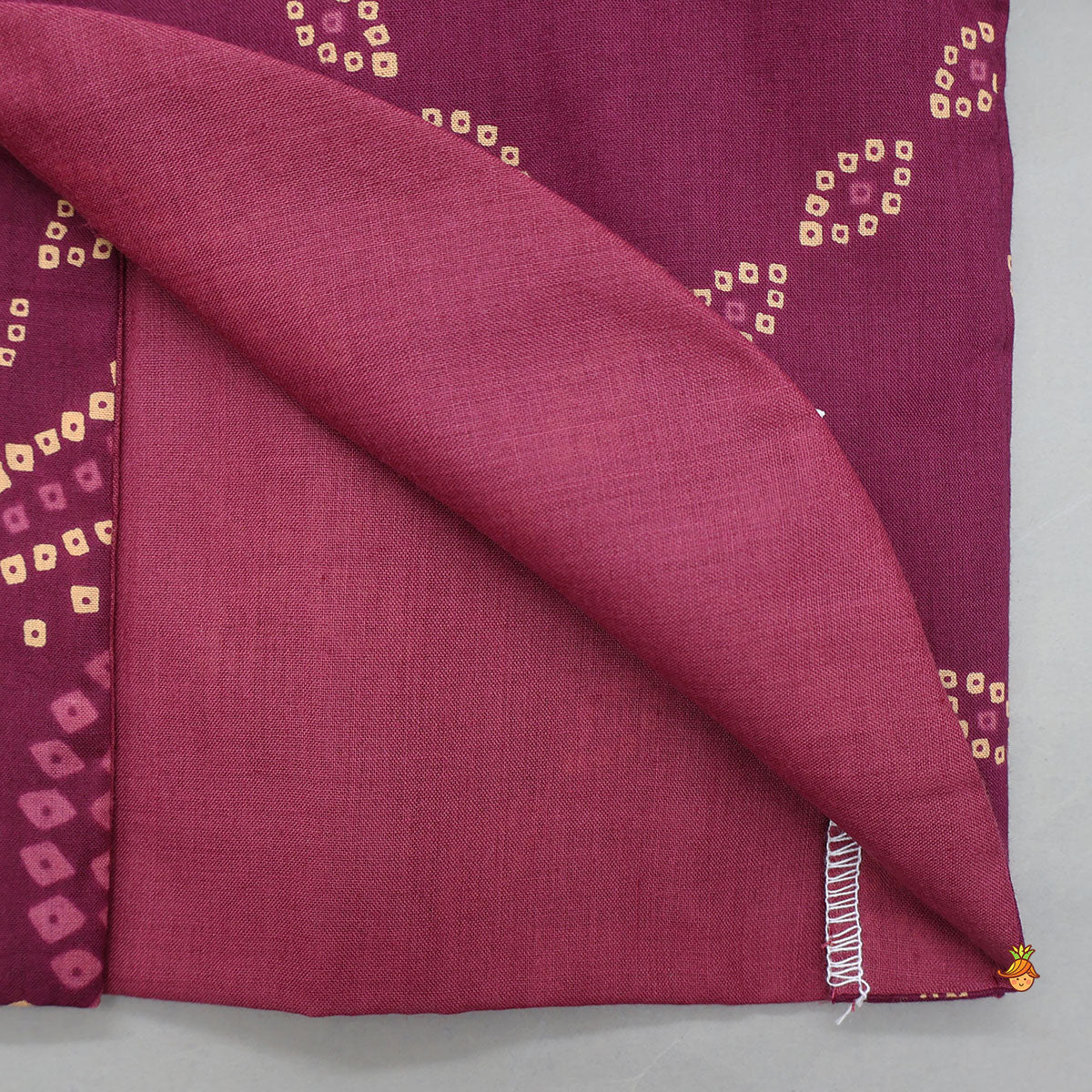 Bandhani Printed Kurta And Matching Dhoti With Cap And Booties