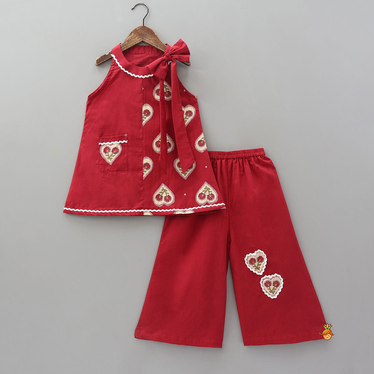 Pre Order: Heart Print Kurta With Statement Shoulder Bow And Palazzo