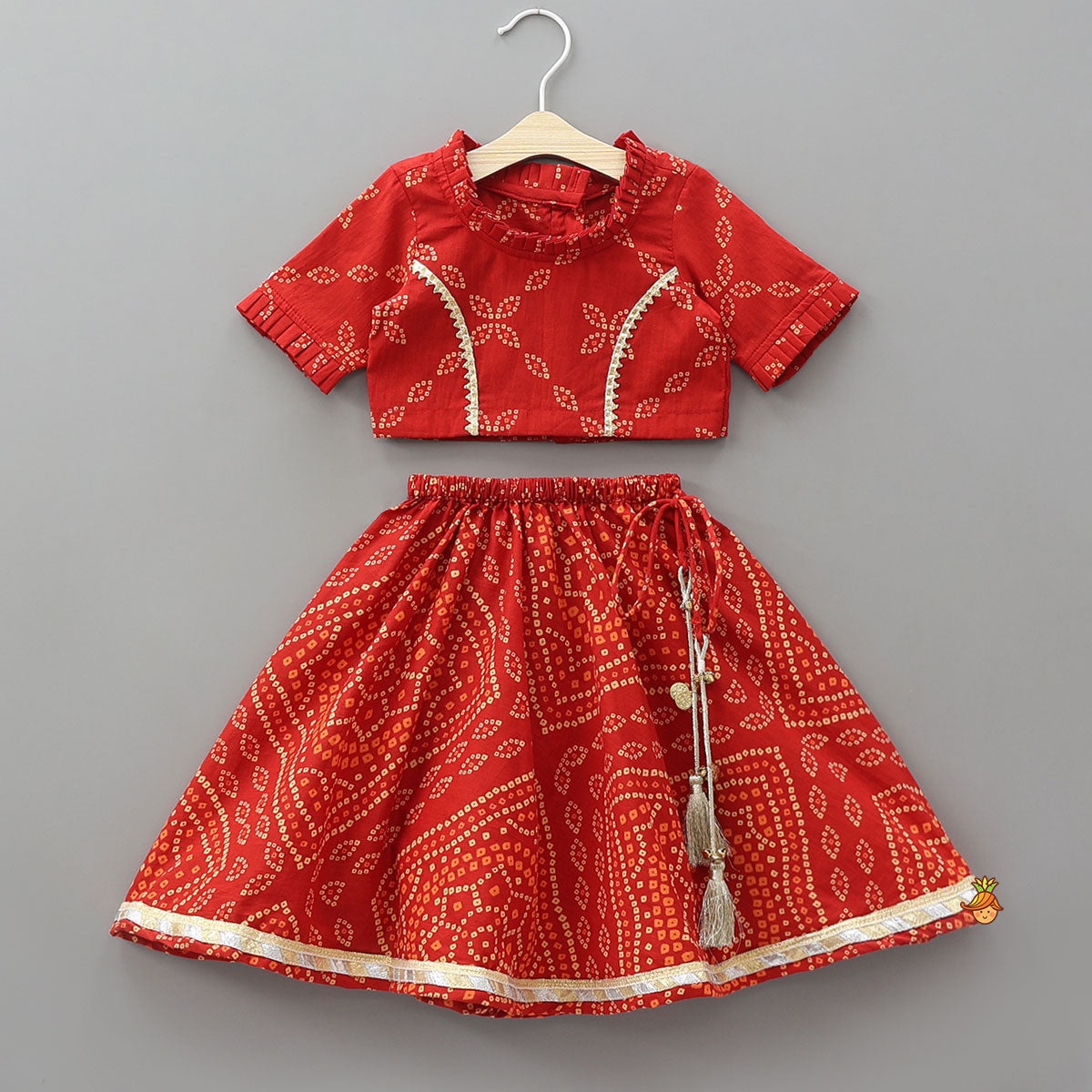 Bandhani Printed Crop Top And Lehenga With Matching Booties And Head Band