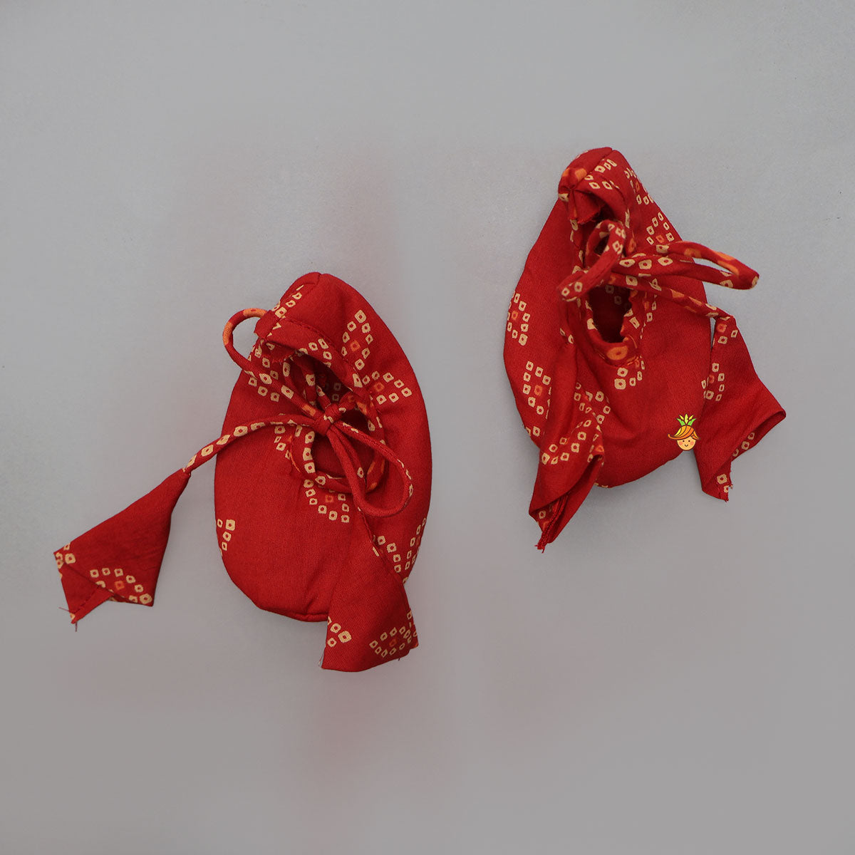 Bandhani Printed Crop Top And Lehenga With Matching Booties And Head Band