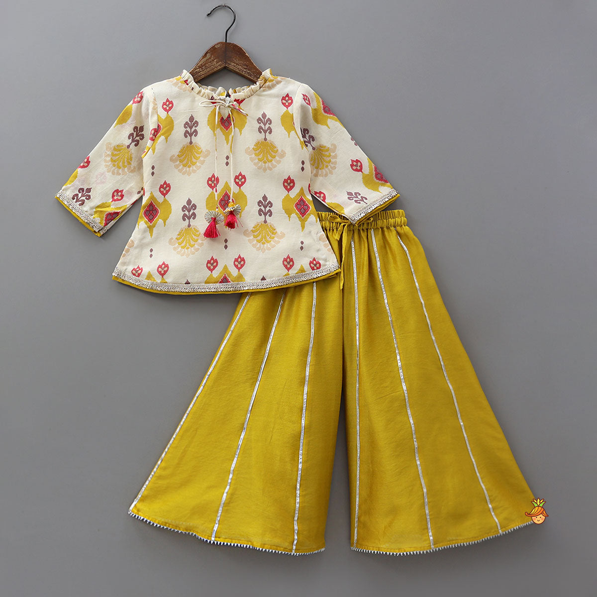 Pre Order: Ikat Inspired Kurti With Gota Detailed Flared Palazzo