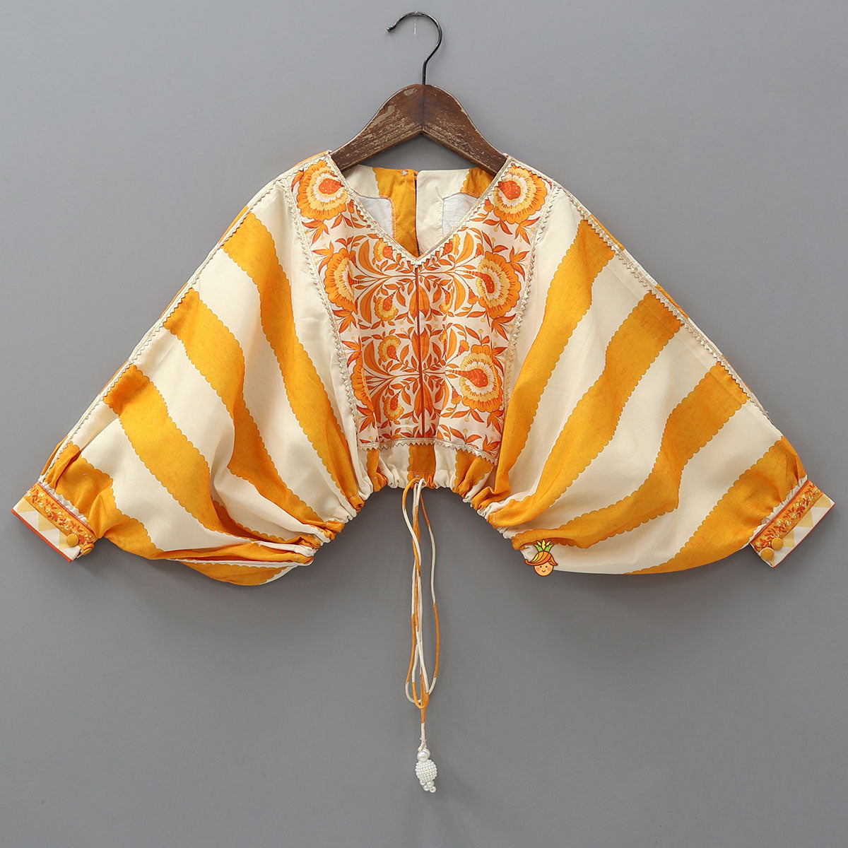 Pre Order: Kaftan Top And Lehenga With Matching Sling Bag