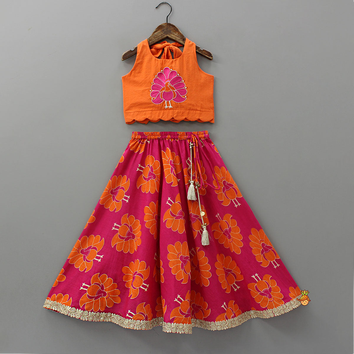 Pre Order: Back-Knot Halter Neck Crop Top And Lehenga