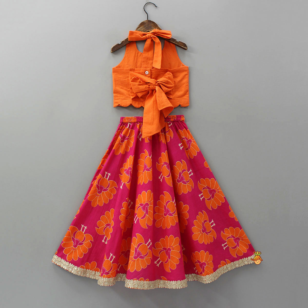 Pre Order: Back-Knot Halter Neck Crop Top And Lehenga