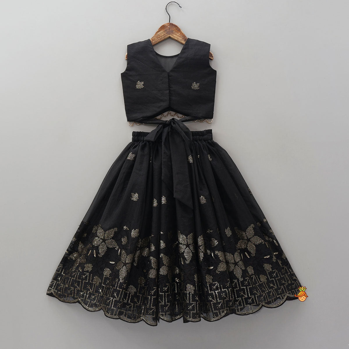 Pre Order: Exquisite Organza Top And Lehenga With Tassel Detailing