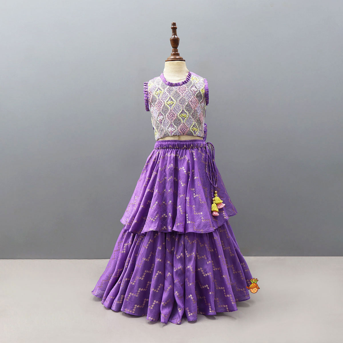 Pre Order: Trendy Open-Back Crop Top And Layered Lehenga