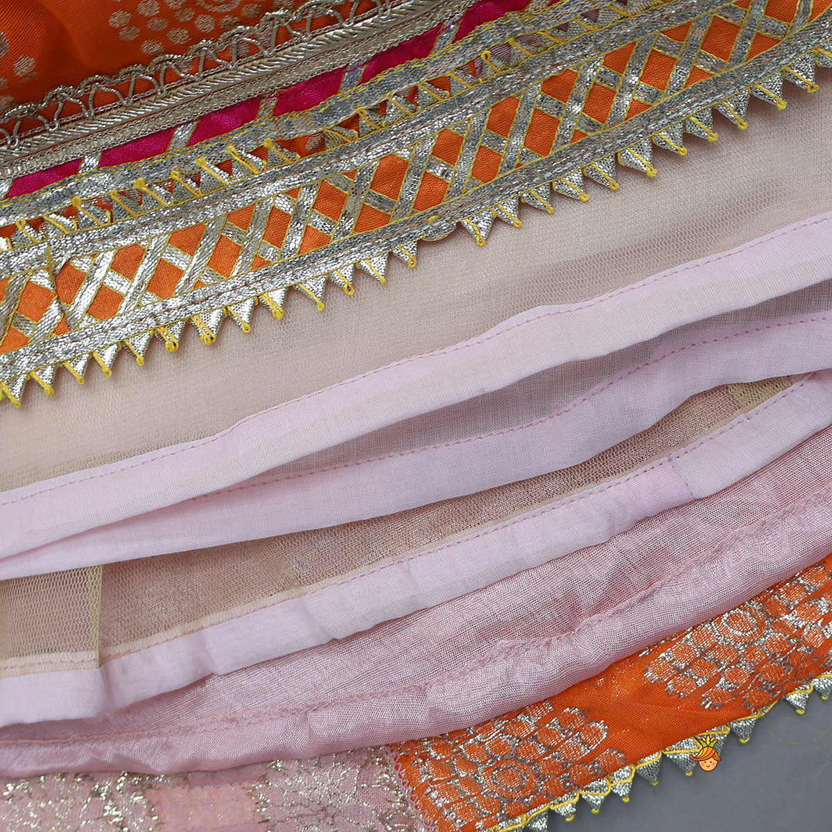 Pre Order: Criss-Cross Knot Tie-Up Crop Top And Lehenga With Sheen Dupatta