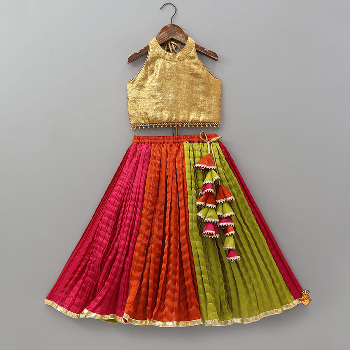 Pre Order: Sheen Finish Halter Neck Crop Top With Crushed Lehenga