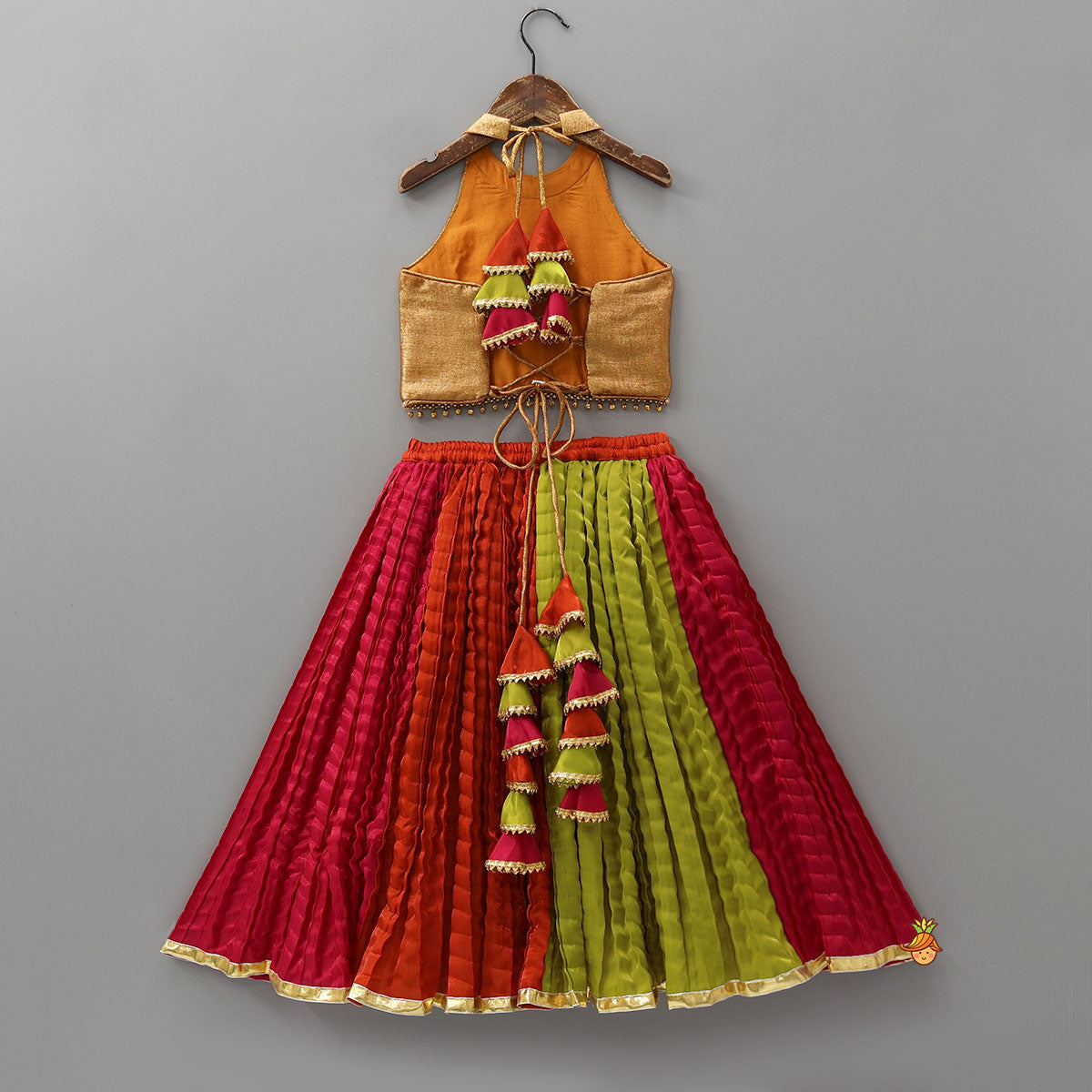 Pre Order: Sheen Finish Halter Neck Crop Top With Crushed Lehenga