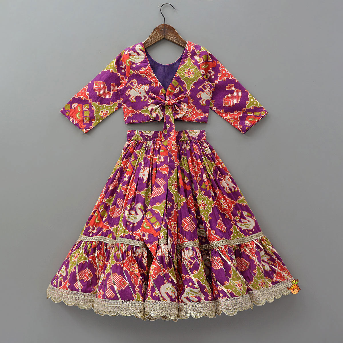 Pre Order: Patola Inspired Printed Crop Top With Flared Lehenga And Dupatta