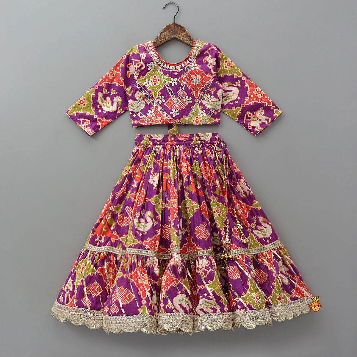 Pre Order: Patola Inspired Printed Crop Top With Flared Lehenga And Dupatta