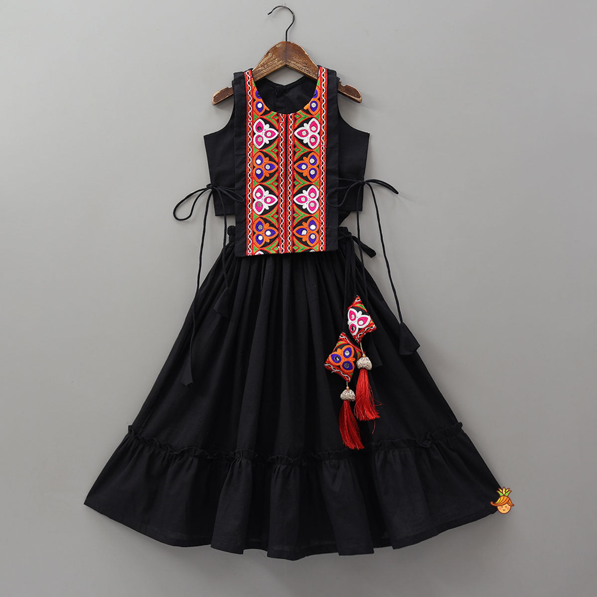 Pre Order: Top With Embroidered Overlay Cape And Tassel Detailed Flared Lehenga