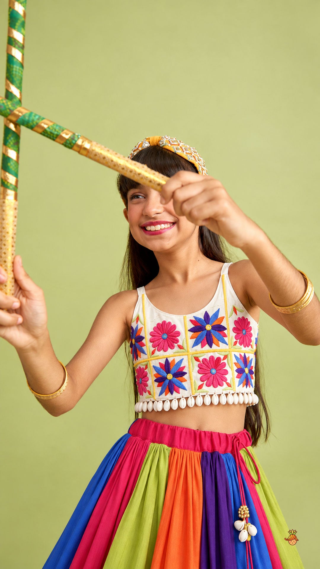 Pre Order: Floral Embroidered Top With Flared Panelled Lehenga And Potli Bag