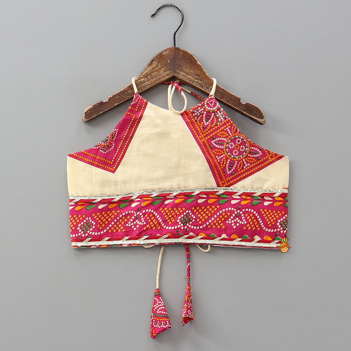 Pre Order: Tie-Up Back Bandhani-Printed Top And Lehenga