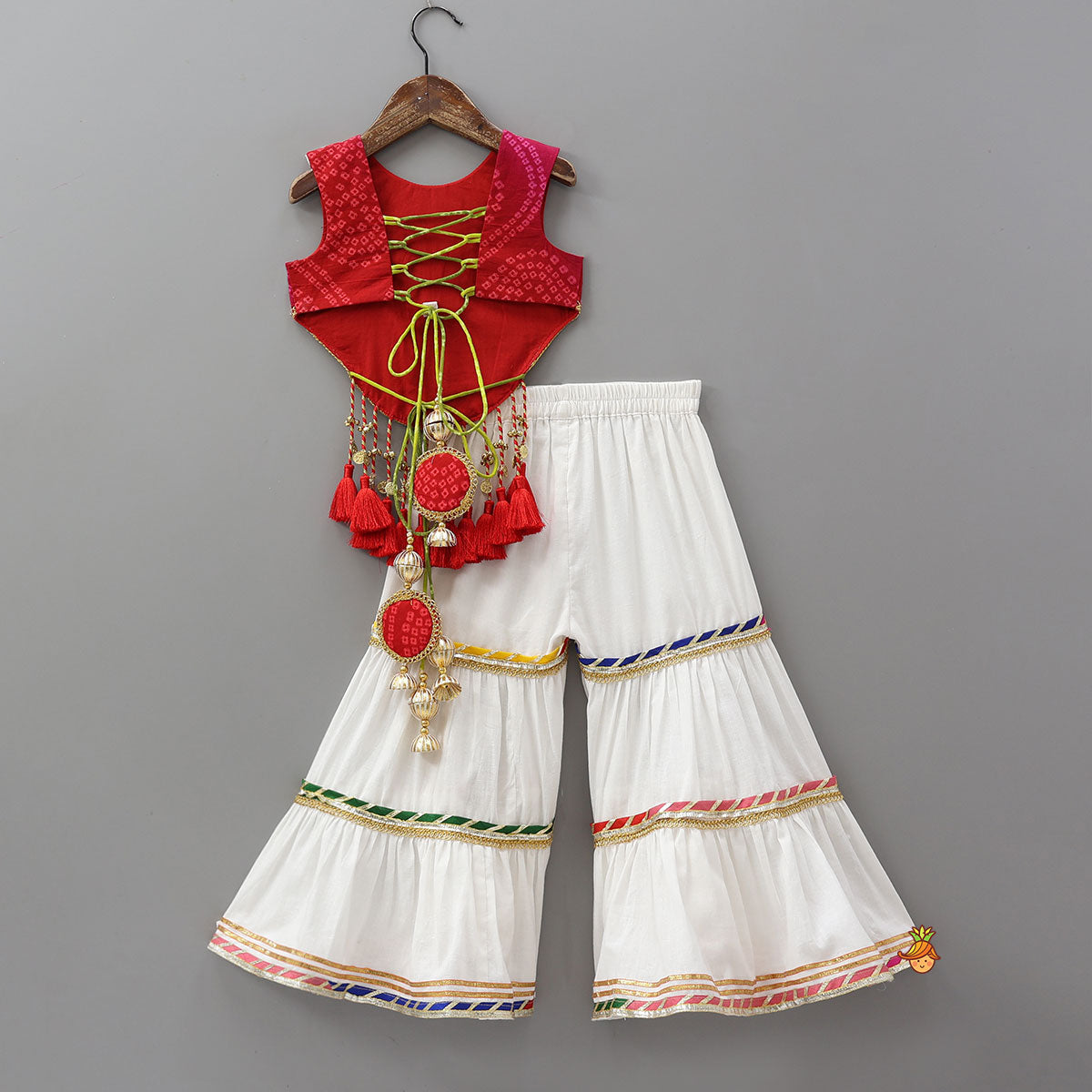 Pre Order: Curved Hem Bandhani Printed Top And Tiered Sharara With Bandhana